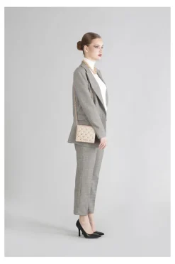 mini bag glitterata con borchie esagonali oro