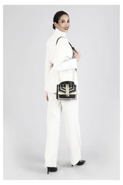 minibag multimariale e stampa pitone con borchie e strass