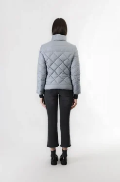 piumino corto con trapuntatura a rombi polvere