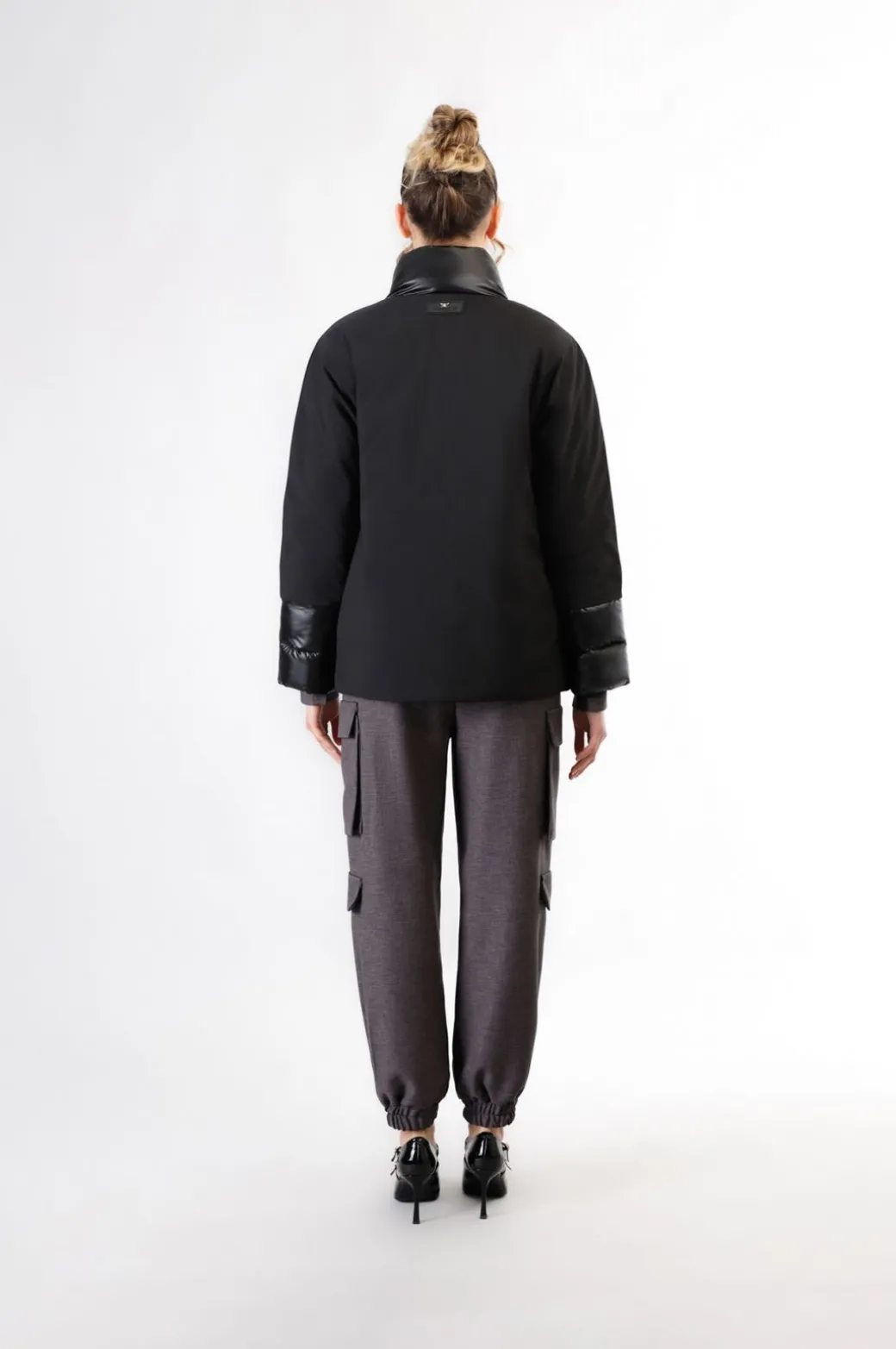 piumino tipo cappa bimateriale nero