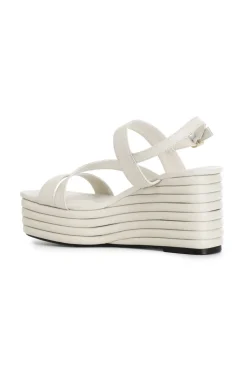 sandali asimmetrici in nappa con zeppa effetto imbottito panna