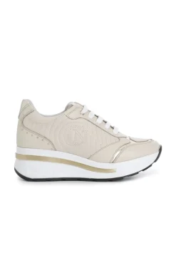 sneakers in pelle con ricamo imbottito beige