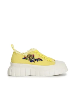 sneakers in tessuto sfrangiato e patch di strass giallo