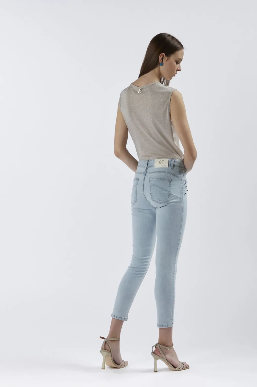 top corto smanicato in jersey con lurex light gold