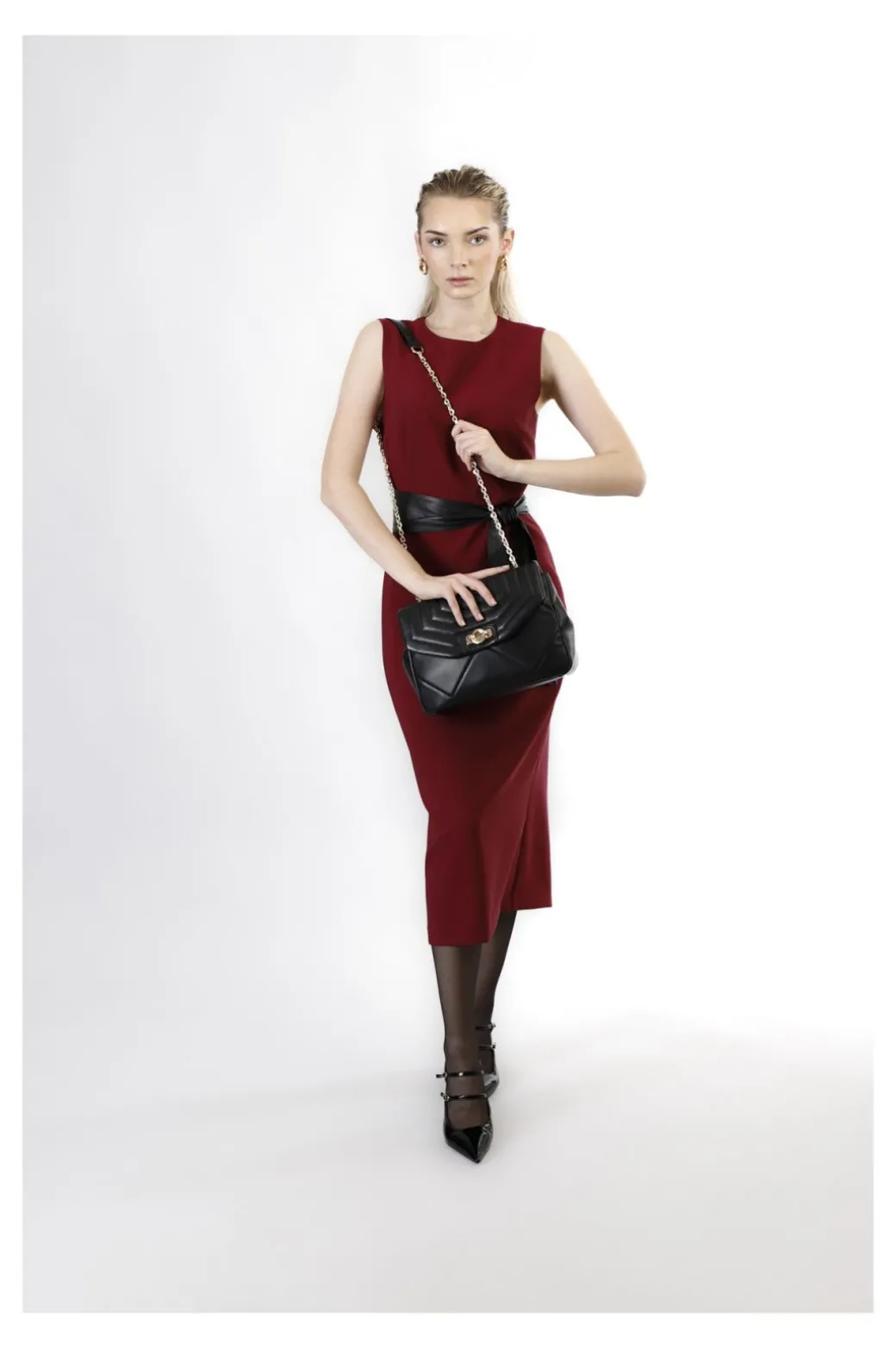 tracolla trapuntata con motivo a rombi e pattina trapuntata nero