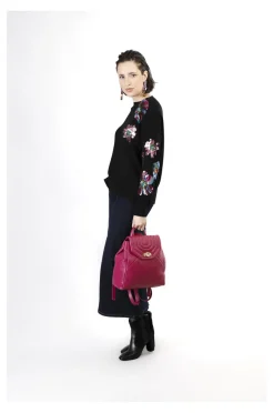 zaino trapuntato con motivo a rombi e pattina trapuntata fuxia